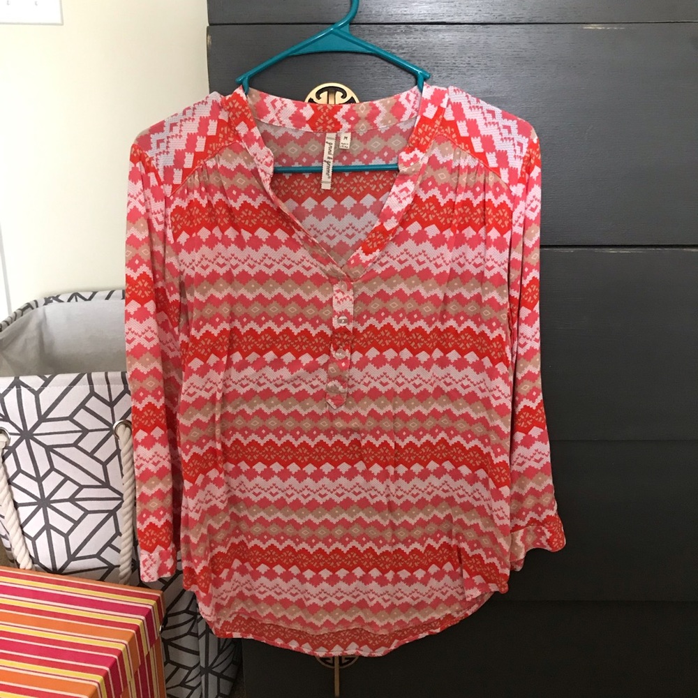 Orange tribal print shirts